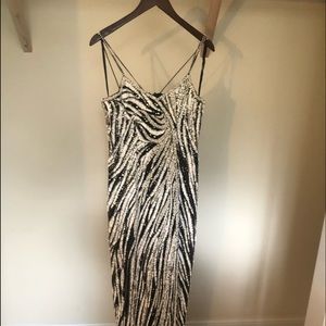 Black and white beaded gown with slit